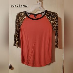 Coral with leopard sleeves